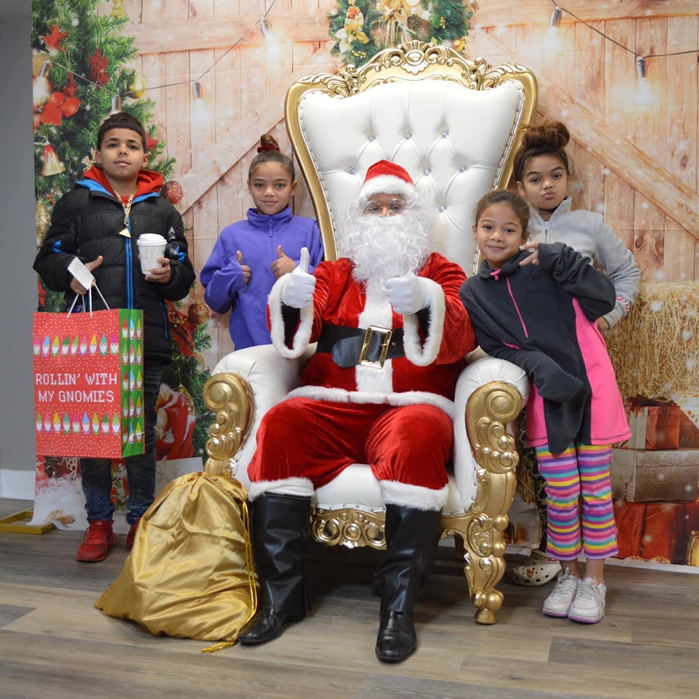 Community Resource Center Santa with children for Angel Tree